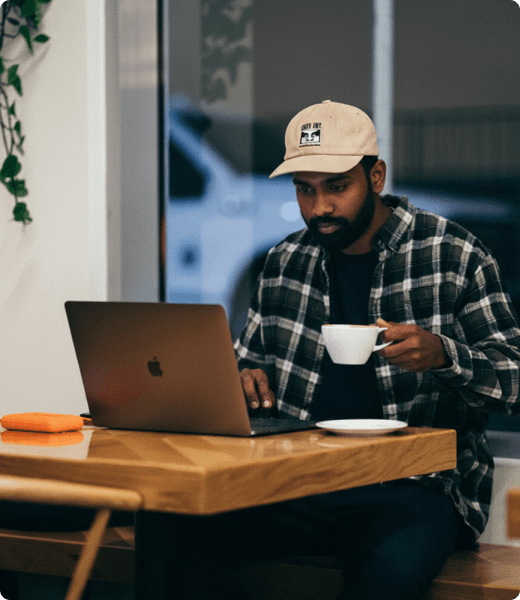 Tailor working on laptop